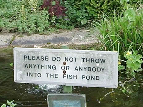 Funny fish pond sign board 