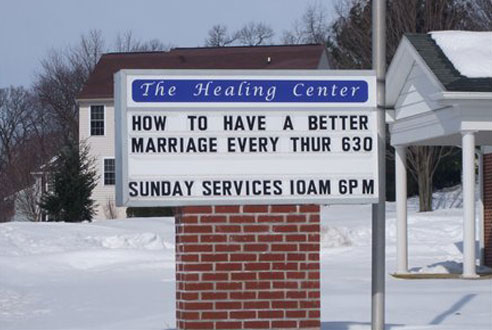 Funny healing center sign board