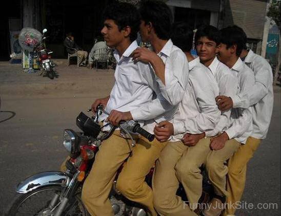 Boys On Two Wheeler Luxury Car Picture