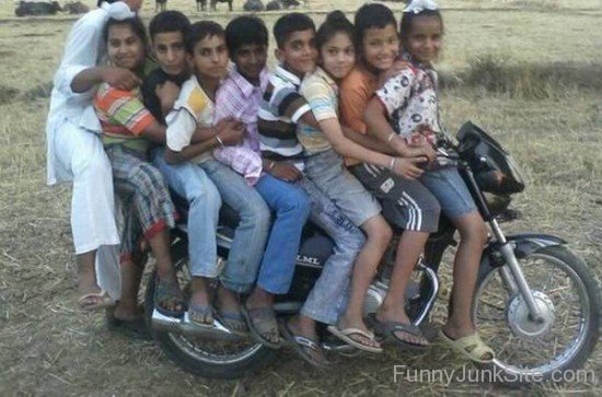 Children Riding On Bike