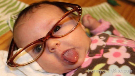 Funny Baby Wearing Glasses